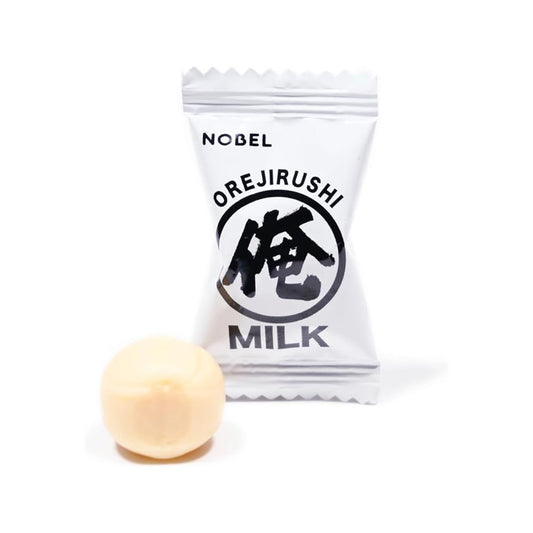 Milk candy and its packaging on a white background