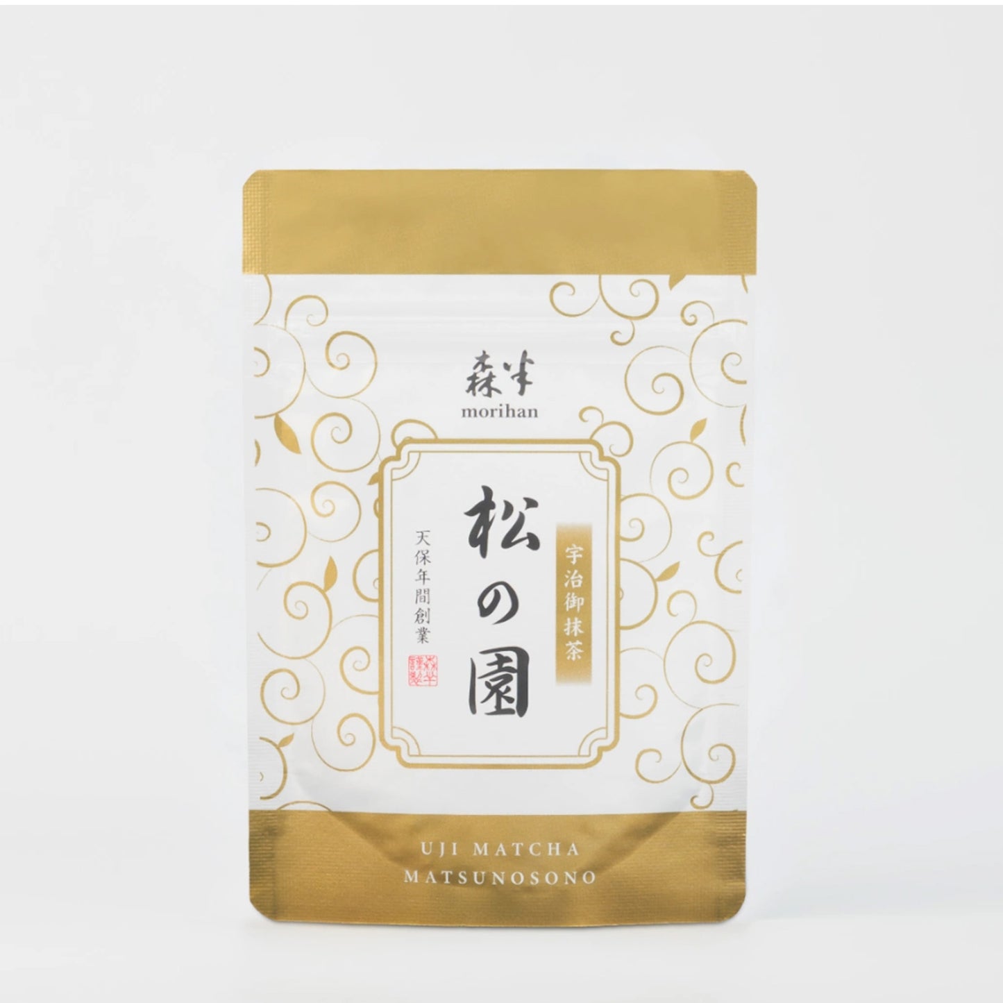 Matcha tea package with gold and white design on a white background