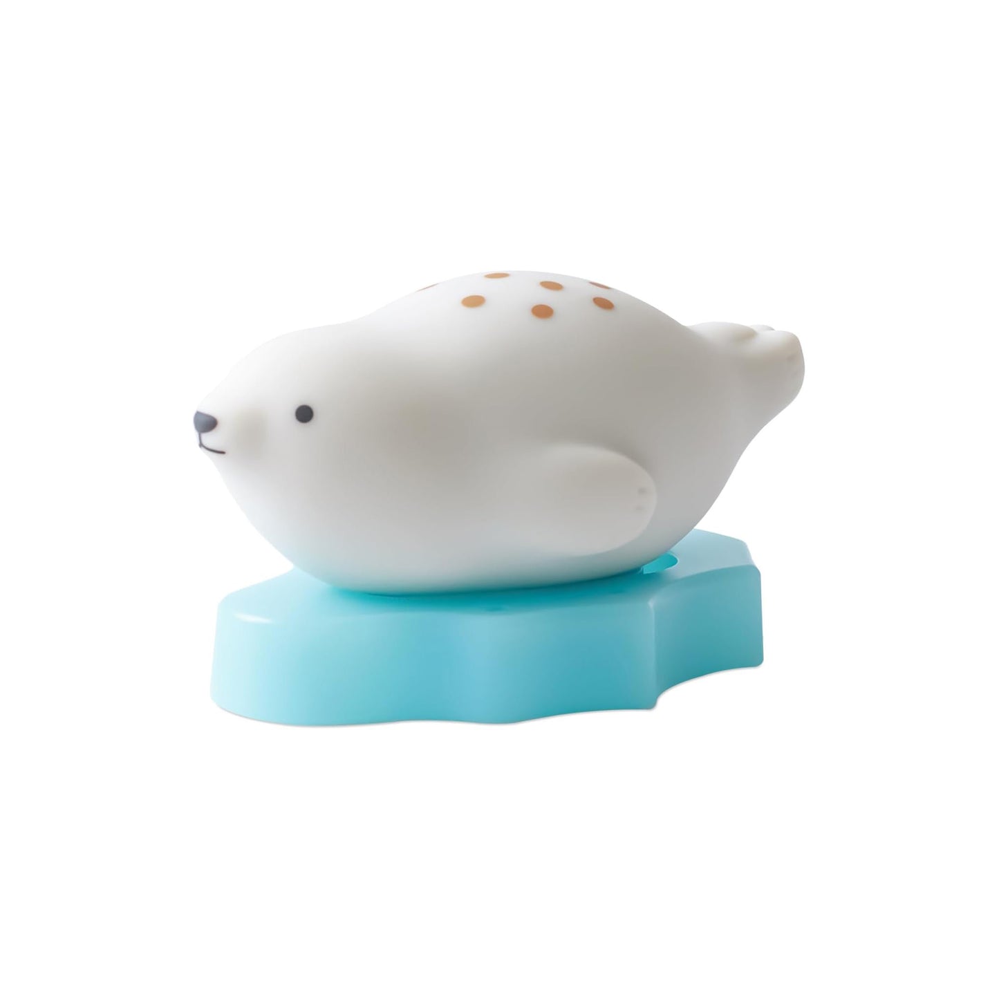 White seal figurine on a blue stand against a white background