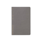 Gray notebook with gold accents on a white background