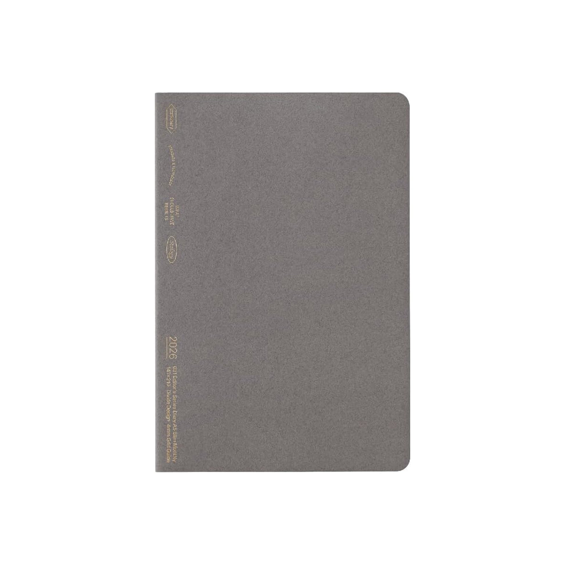 Gray notebook with gold accents on a white background