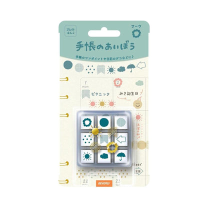 Packaged set of small stamps with various designs on a white background