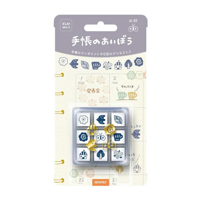 Set of stamps in packaging with Japanese text on a white background