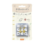 Packaged rubber stamps with various icons on a beige background