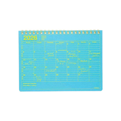 2026 calendar with blue cover and yellow grid on a white background