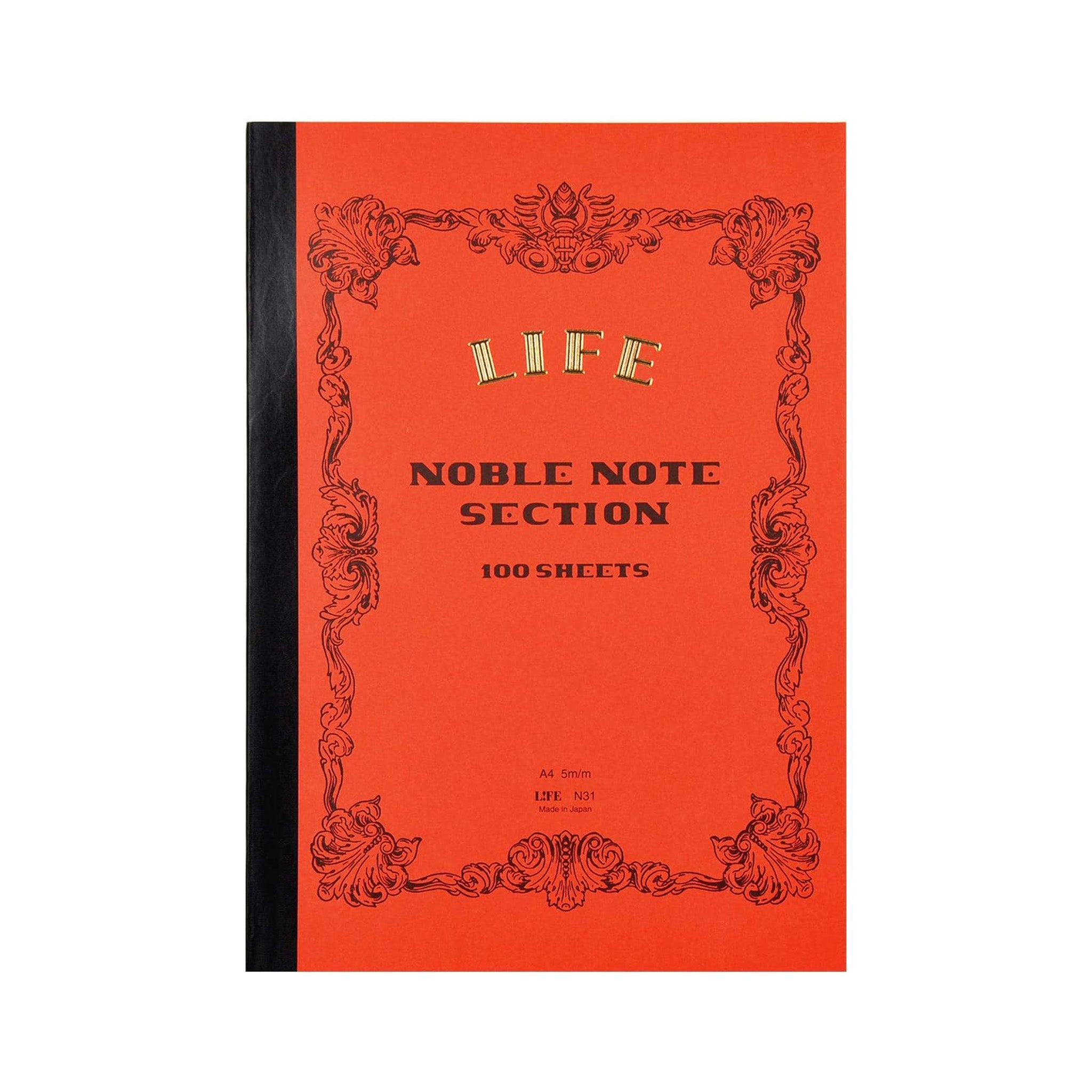 Red notebook with gold text on a white background