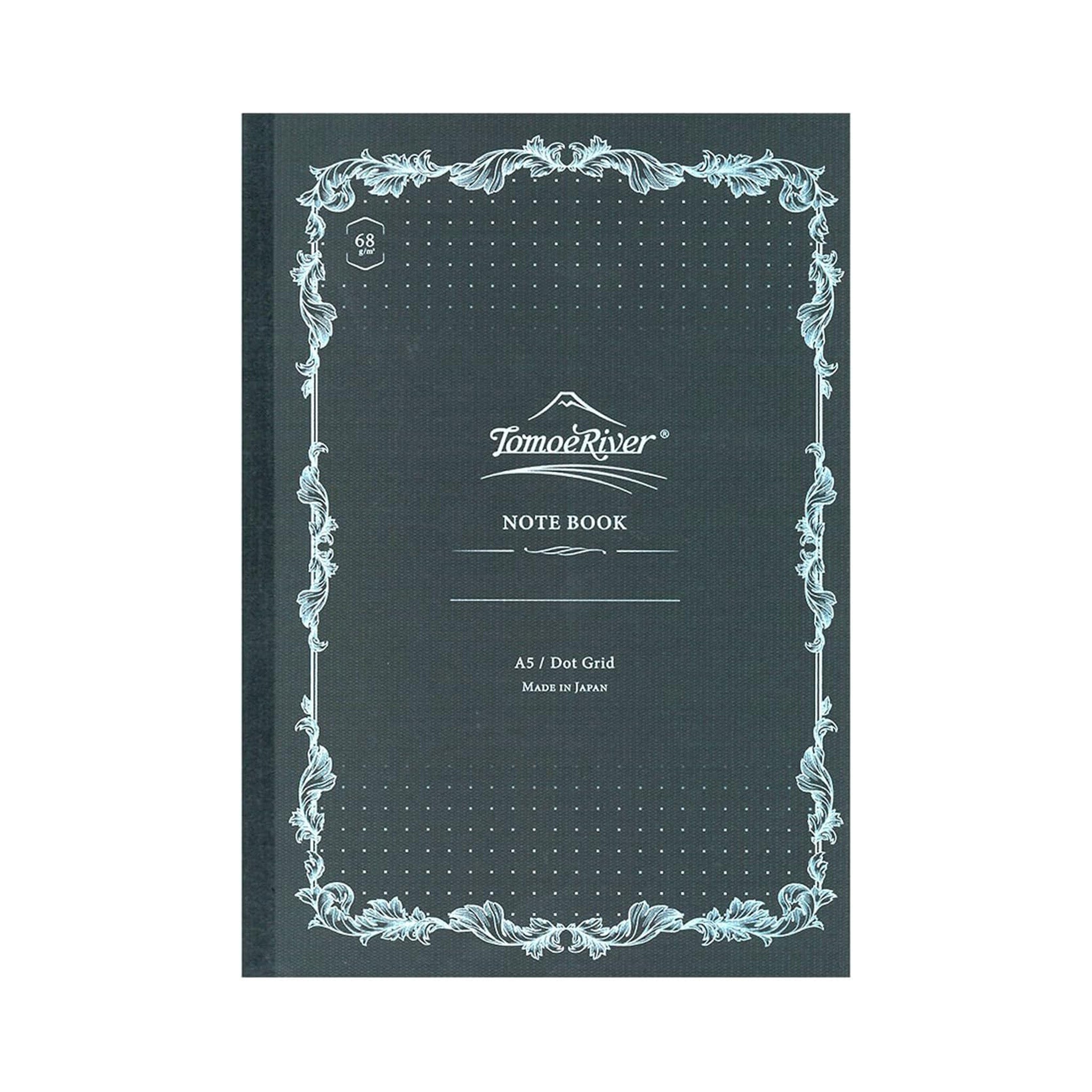 Black notebook with decorative border and 'Tomoe River' branding on a white background