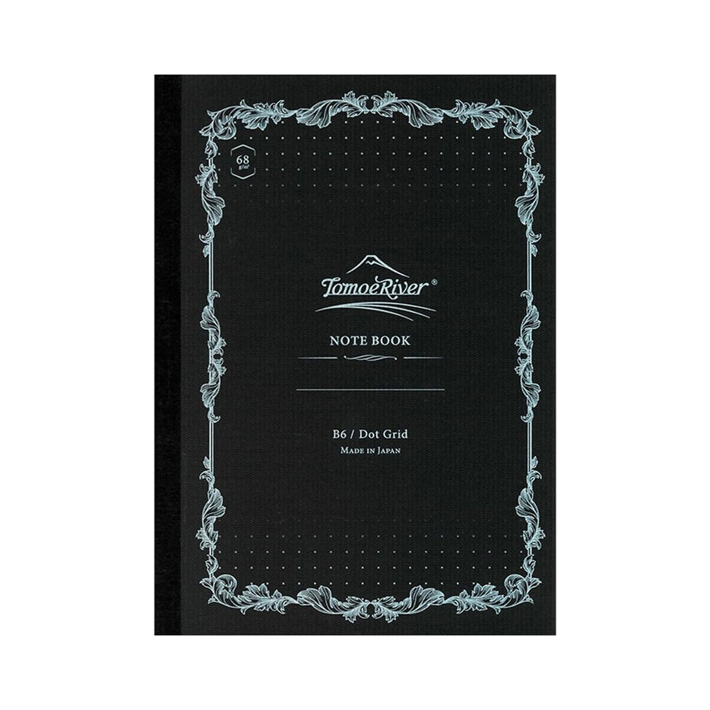 Black notebook with decorative border and 'Tomoe River' branding on a white background
